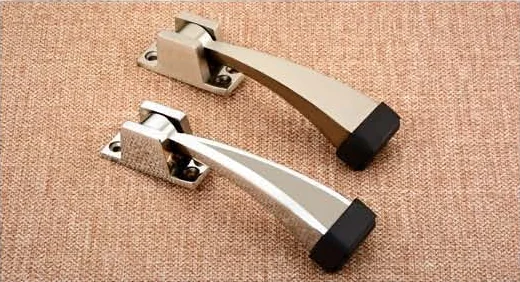 Apple zinc & ss door stoppers by VinRose
